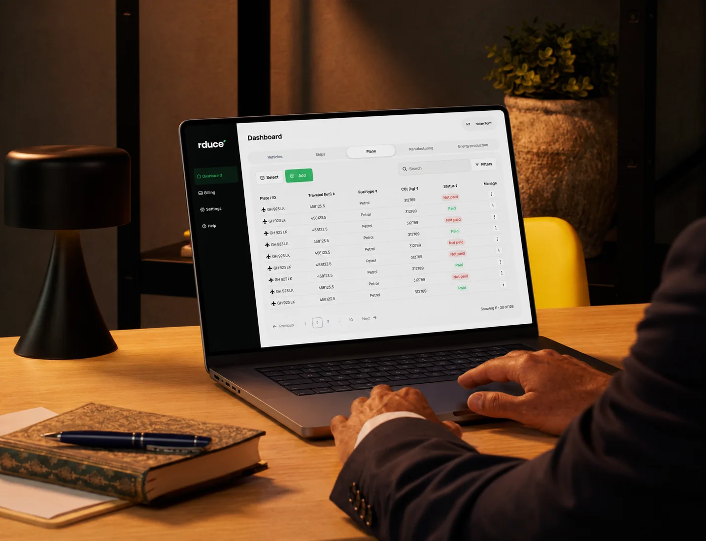 Rduce fleet dashboard on a laptop in an office setting