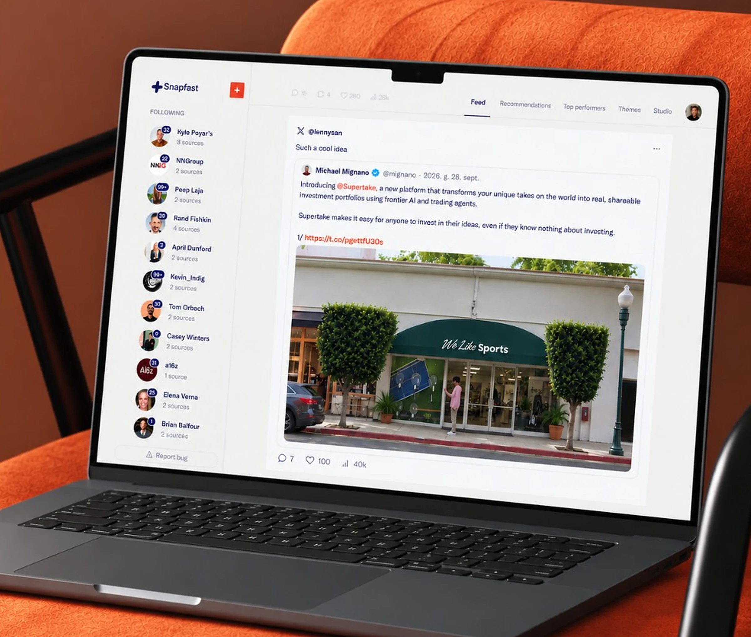 Snapfast open on a laptop, resting on an orange chair
