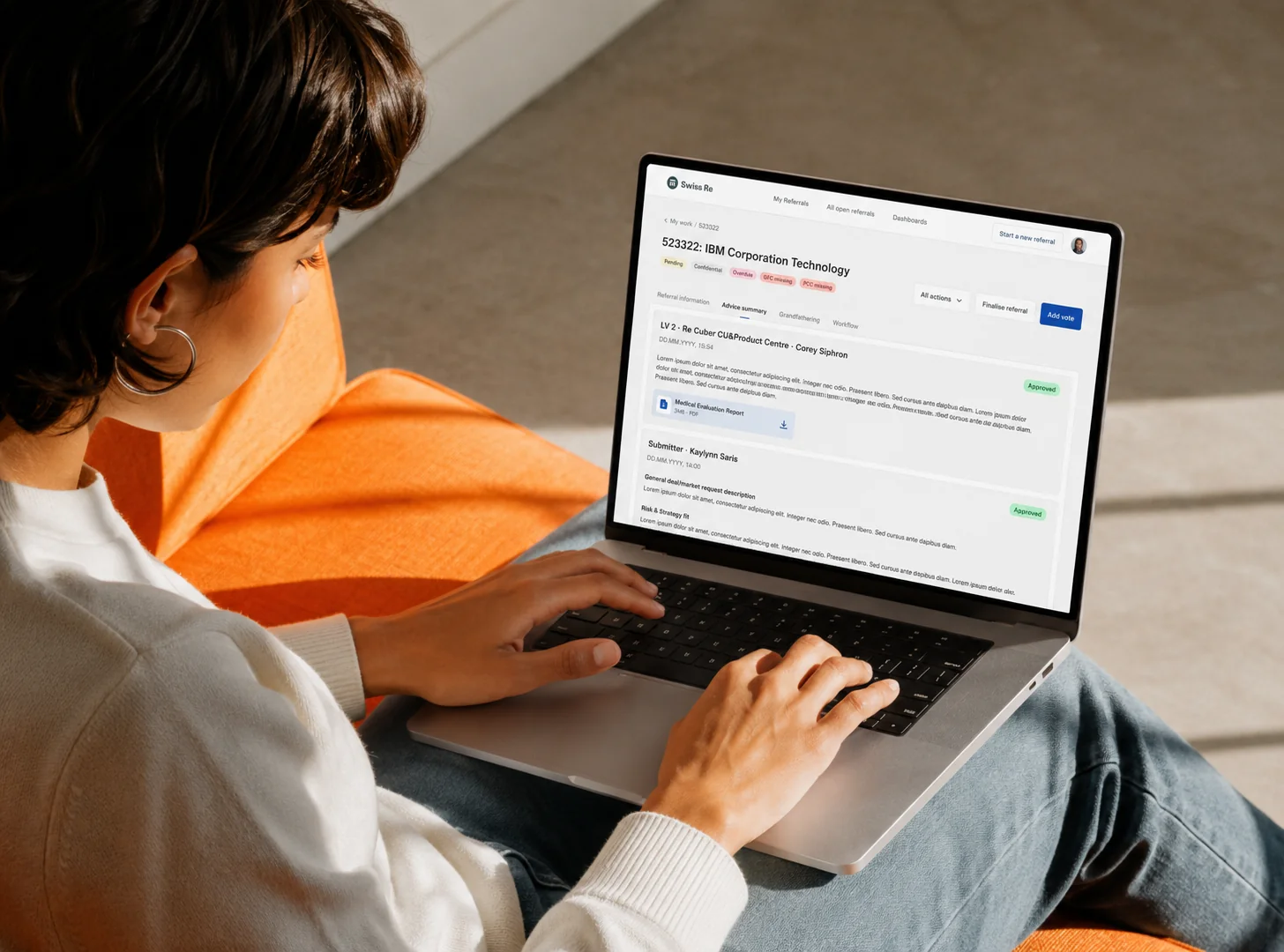 Swiss Re governance platform on a laptop